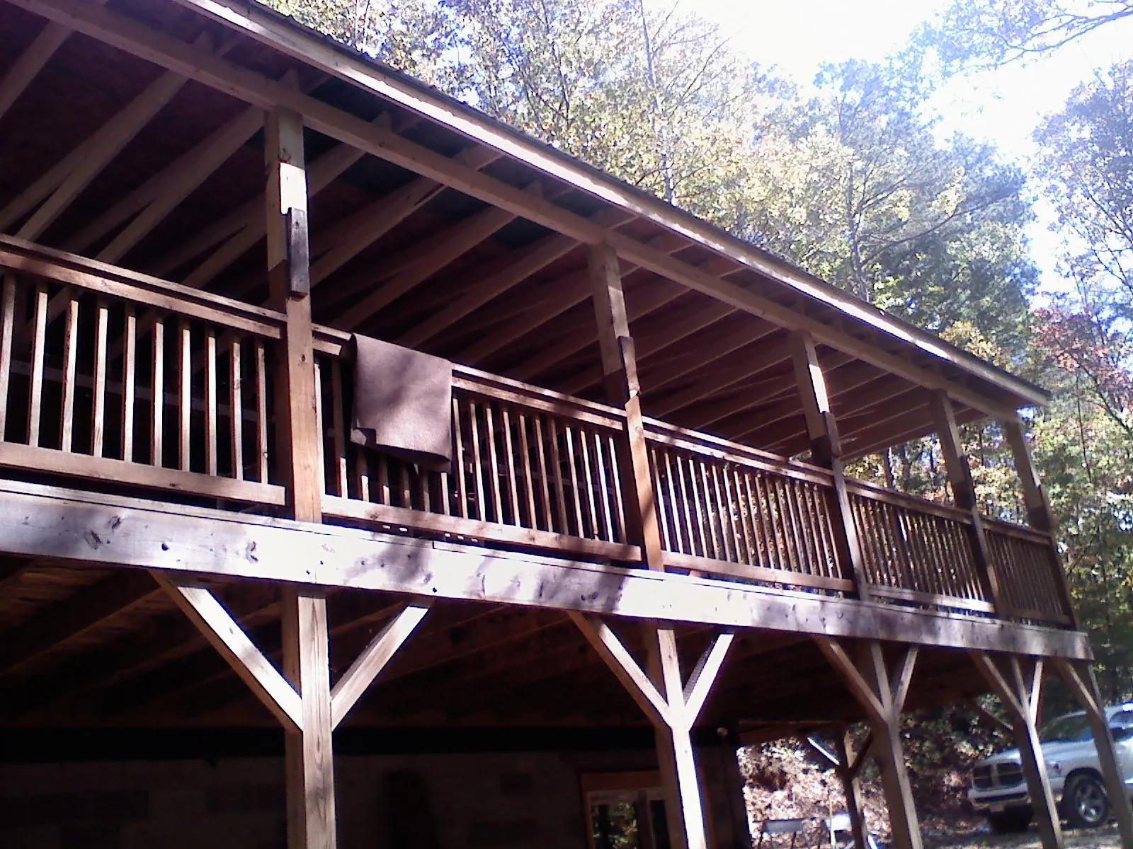 Timber framing under a new elevated porch and deck — Roof Leak Repair in Teeds Grove by Roofing Brothers